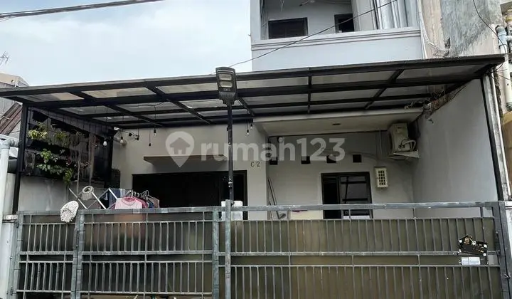 Translation: For Sale 2-Story Minimalist House, Strategic Location Flood-Free, Fully Furnished with Furniture, AC, Refrigerator, TV, etc.