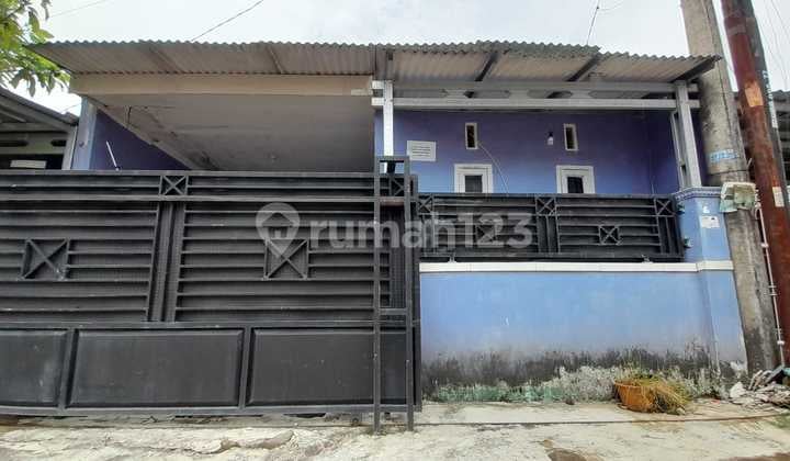 Over Kredit Rumah Puri Anggrek