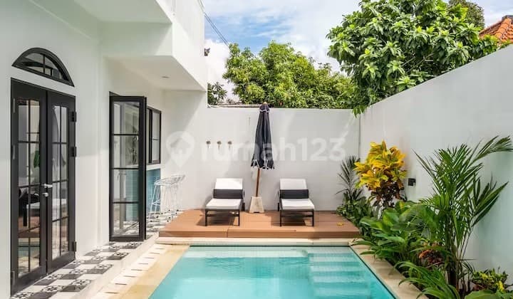 Stylish 3BR Oasis with Rooftop Bar in Prime Sanur (Yearly Rental)