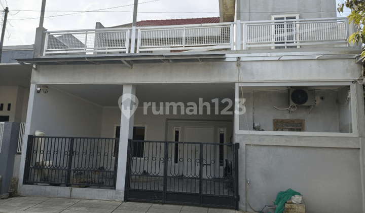 For Sale: Spacious and Comfortable 2-Story House, Ideal for Large Families Location: Harapan Indah 13625