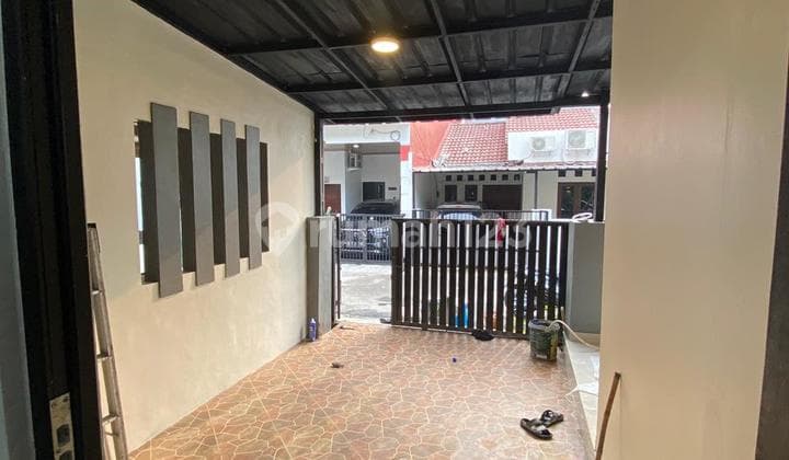 Modern Minimalist House for Sale in the Alam Asri Villa Dago Pamulang Cluster, South Tangerang.