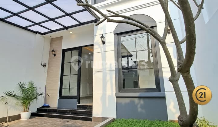 Rumah 2 Lantai Rapih Harga 1 Lantai Siap Huni di Graha Raya 9173