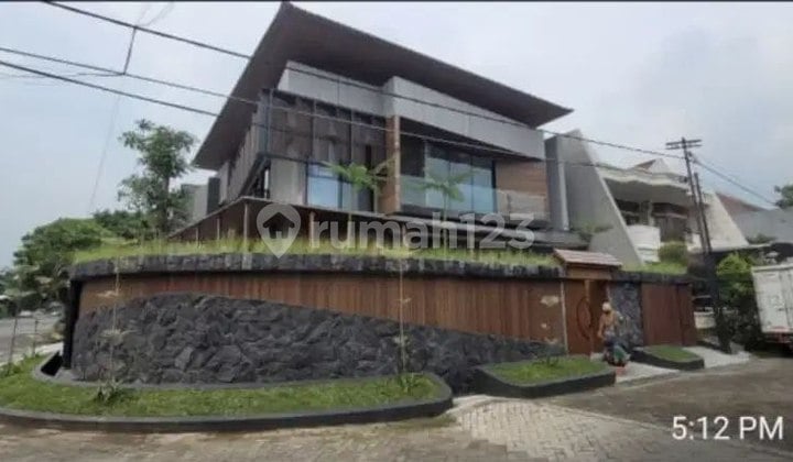 New Tropical House With Waterfall Manyar Kertoadi New Tropical House With Waterfall Manyar Kertoadi