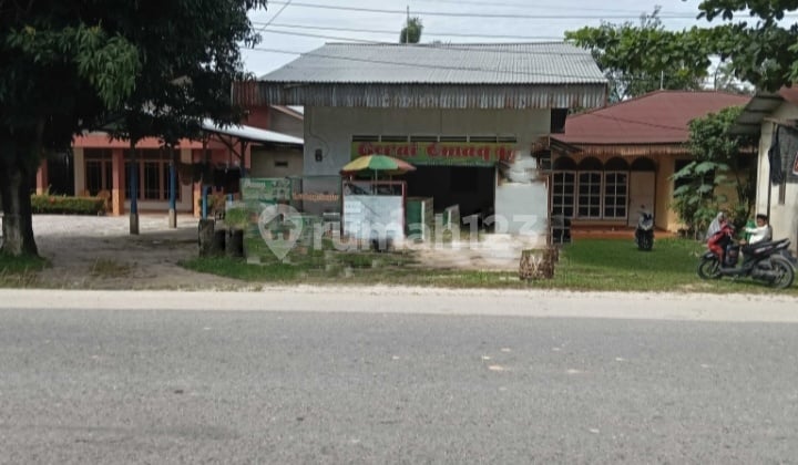 Tanah Luas 1.291M2 dan 2 Rumah Tambah 4 Toko di Tangor Kulim Surat SHM