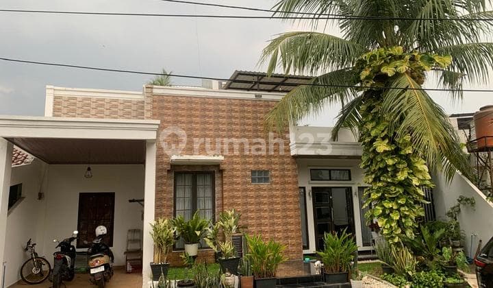 Beautiful House Ready to Live In Front of the Park in Graha Raya