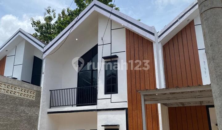 Rumah dengan Gaya Desain Modern 1 Lantai Minimalis Akses Mobil