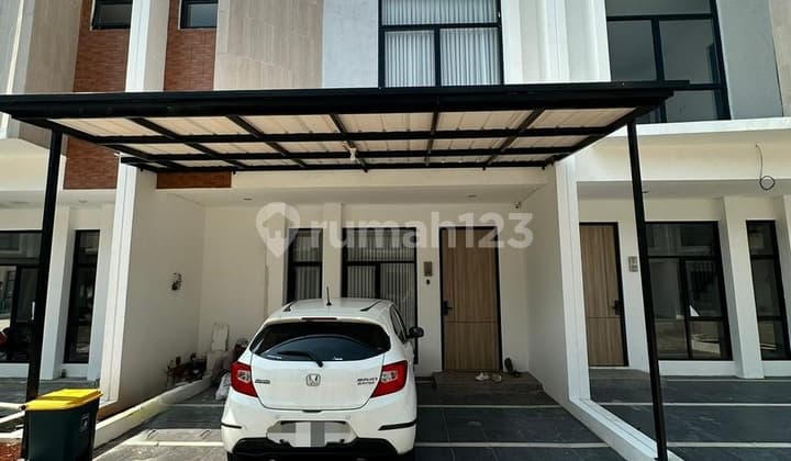 Rumah Hadap Selatan dengan Roof Top Dekat Tol di Bintaro