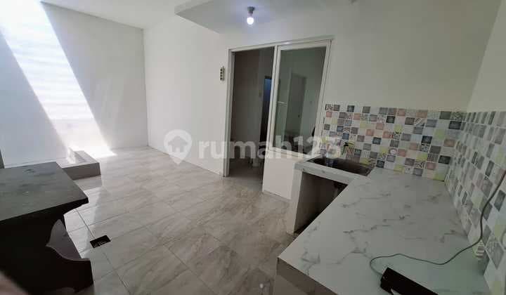 DIJUAL RUMAH SECOND TERAWAT 2 LANTAI DI GREEN MANSION LONTAR SURABAYA