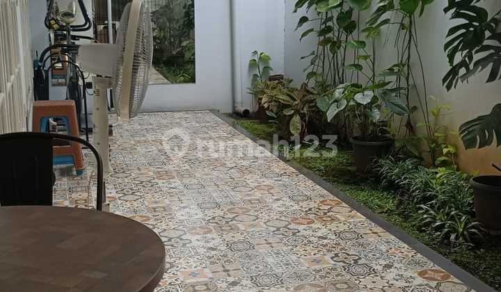 2-Story House with a Lush Backyard