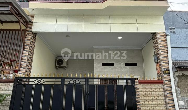 Rimah 2 Lantai Siap Huni Tempat Strategis di Perumahampolis Indah Kota Tangerang