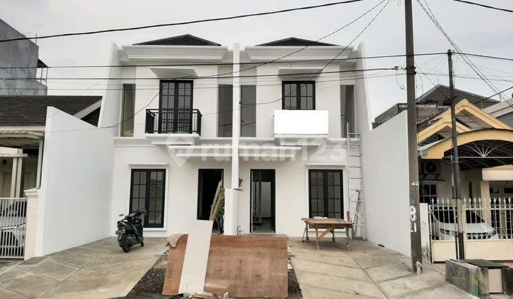 A013. For Sale New Modern Minimalist House in Pondok Candra, Kembar Street.