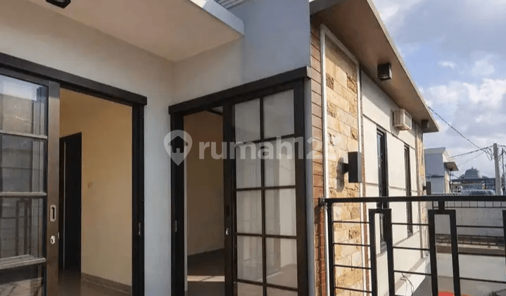 Rumah Bali Style LT 50 LB 80 - Balkon Luas Favorit Banyak Orang