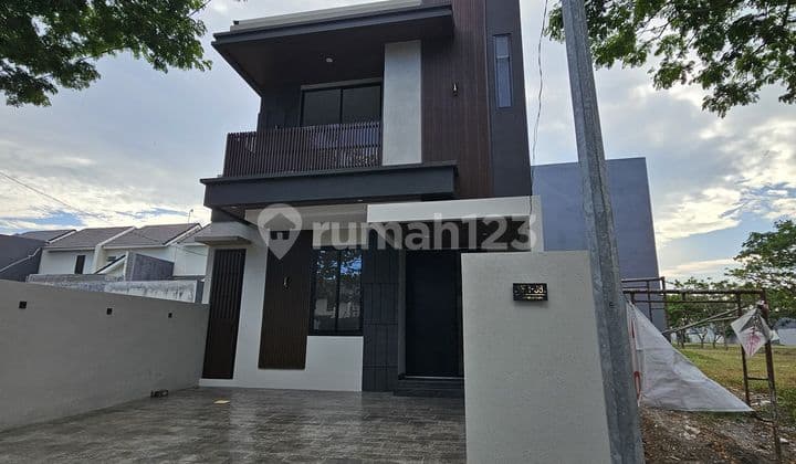 Modern Minimalist Residential House in Citraland Surabaya
