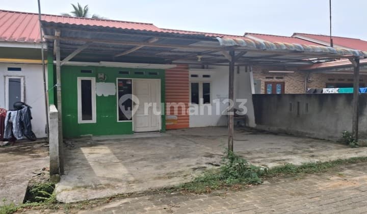 Rumah dengan Sisa Tanah Cukup 1 Mobil
