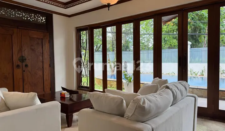 Scenic Corner House with Private Pool in Kebayoran Baru