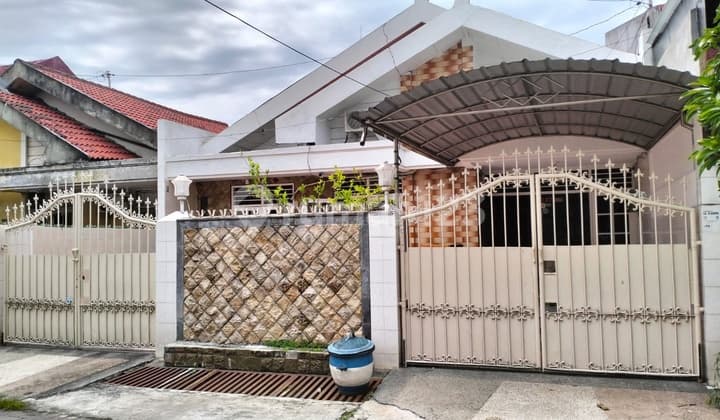 A beautiful and well-maintained house in Darmo Harapan Indah, West Surabaya.