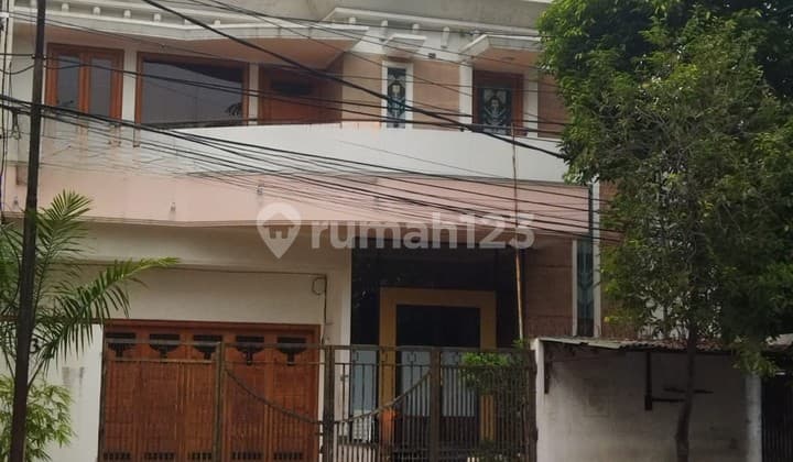 rumah rajawali selatan luas 533m pinggir jalan raya hadap selatan sudah tinggi dari jalan