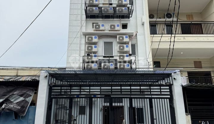 rumah kost jelambar luas tanah 110m bangunan 4 lantai harga perkamar 1.8 Jt