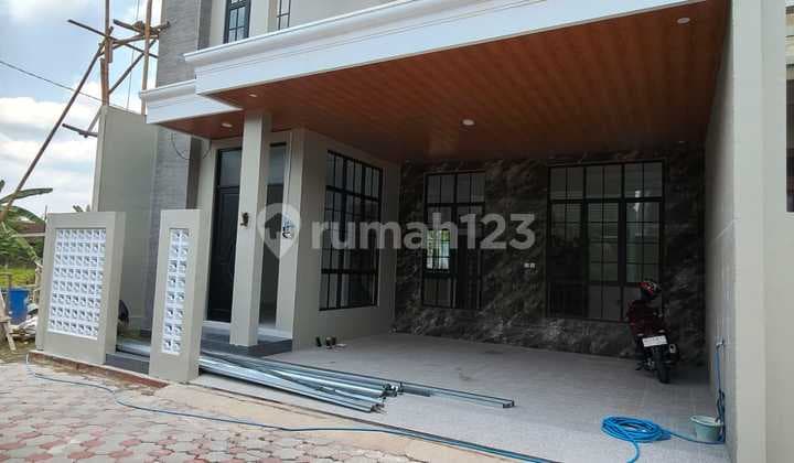 Rumah 2 Lantai siap huni di jl Kaliurang Km 10,Dekat Pasar Gentan