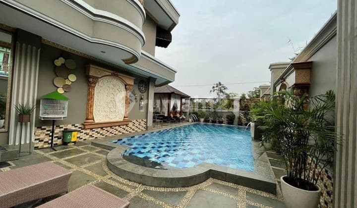 Rumah mewah ada kolam renang,siap huni di Perum Taman Modren Jakarta Timur