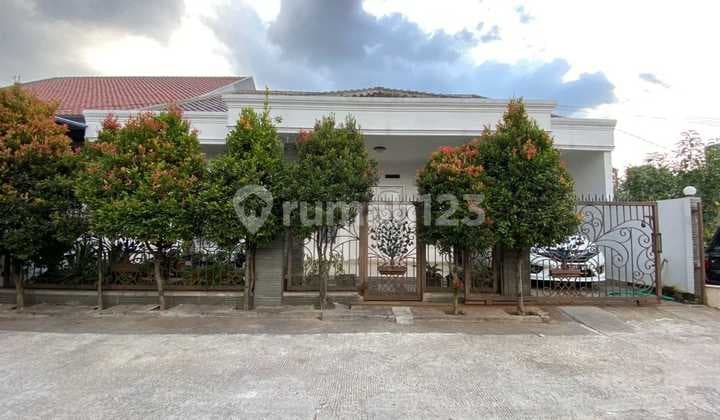 Ready-to-occupy house on a wide road near TEL-U in Ciganitri, Bojong Soang - Buah Batu extension.
