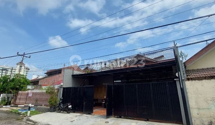 Sell House in Seroja, Semarang — Just a step away from the intersection, suitable for retail business. Land area 258 sqm, fully built, 1100 watts electricity, pump well & bore well.