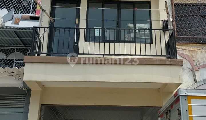 FRANS CEN-disewa Ruko di pesing kedoya..pasar inpres seberangnya.jarang ada lt.4x22/3lt..