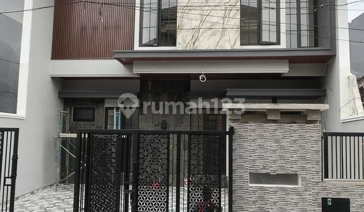 A Strategic Good House for Sale in Wisma Permai Surabaya, Safe 166