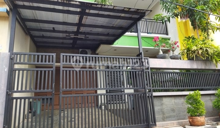 Rumah Minimalis Jalur Dua Mobil
