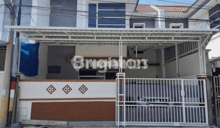 Lebak Indah Town house murah baru renov