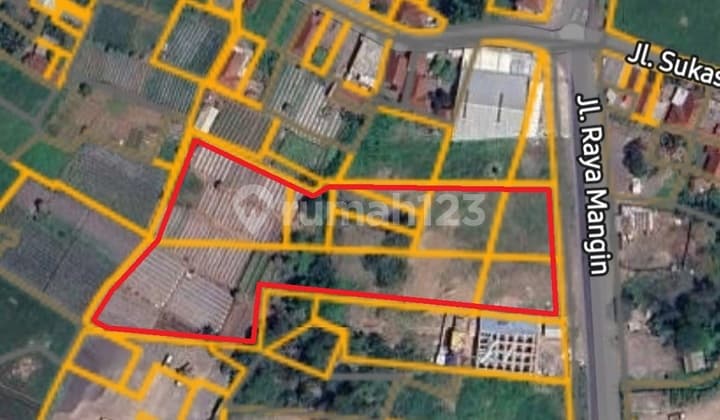 Land 6,845 m² with SHM (Certificate of Land Rights) on Jl Raya Mangin, Sukajaya