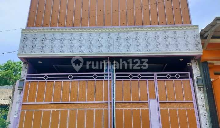 Rumah Siap Huni 2 Lantai Warna Ungu Perumahan Griya Tangerang Asri Rajeg