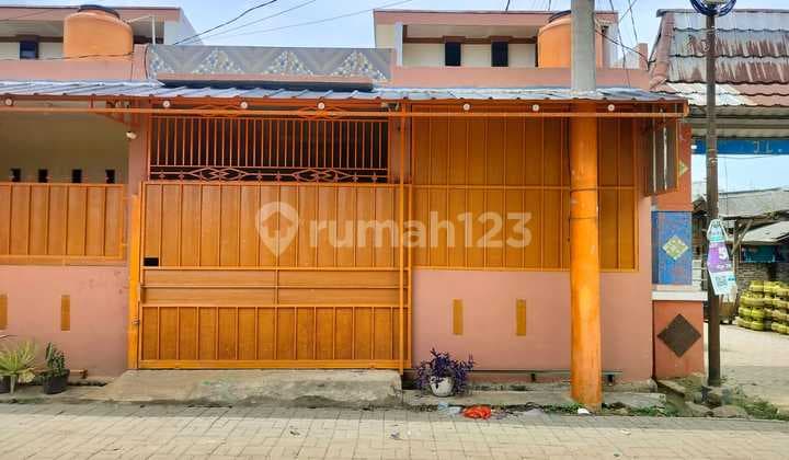 Rumah Siap Huni 1 Lantai Warna Oranye Perumahan Griya Tangerang Asri Rajeg
