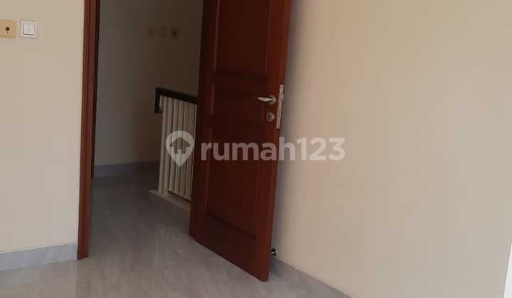 Rumah di Green Lake City Cluster Amerika