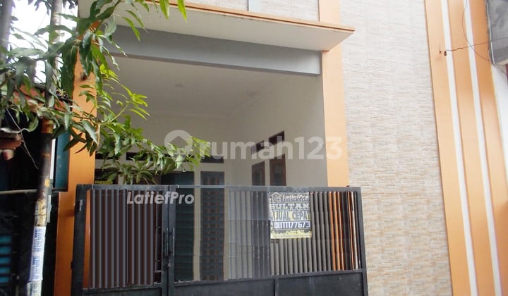 Rumah Merah Harga Parah Semoga Berkah