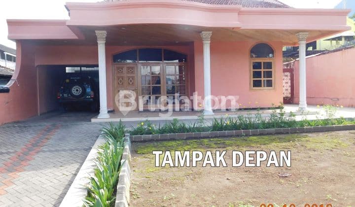 rumah dipinggir jalan besar kota batu