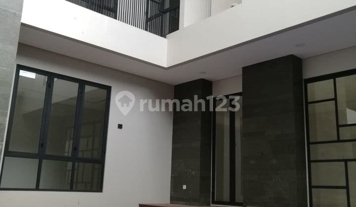 Rumah Contemporary Tropical Modern di Emerald Cove, Gading Serpong, Tangerang