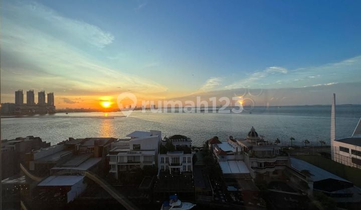 DIJUAL RUGI .. APARTEMEN PANTAI MUTIARA , FURNISHED , VIEW SANGAT BAGUS , TINGGAL ANGKAT KOPER