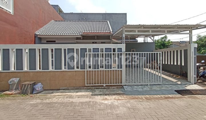 Rumah modern di jatisari permai bekasi lingkungan asri bebas banjir harga menarik