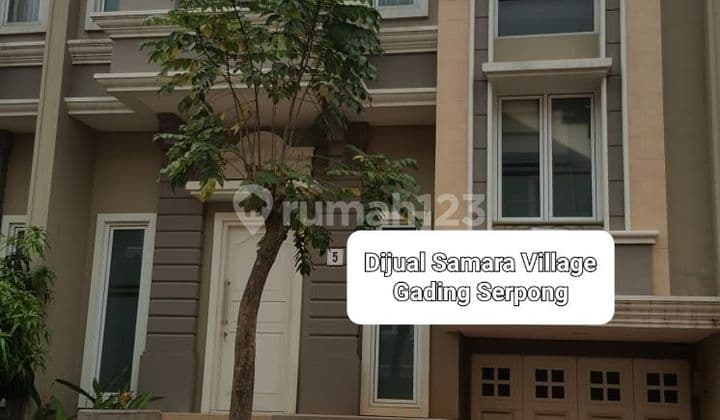 For sale: a neat 3-story house in a strategic location.