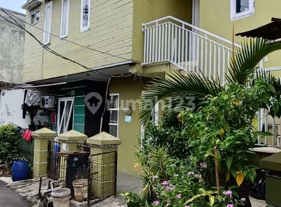 7-Door Investment House in a Strategic Location, Stable Monthly Income of 4.9 Million.