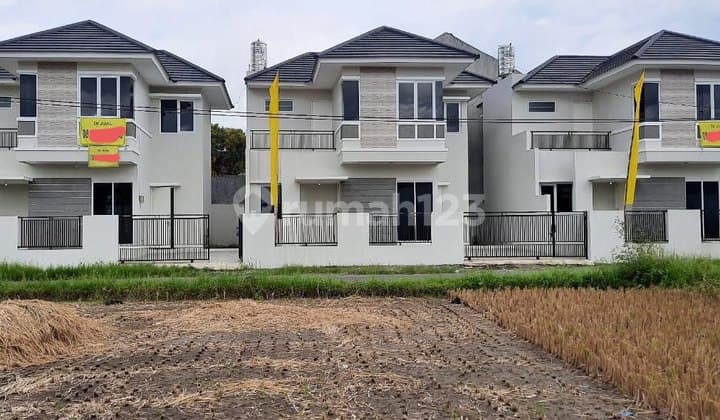 Minimalist 2-Story House by the Asphalt Road near Pesona Bandara Land
