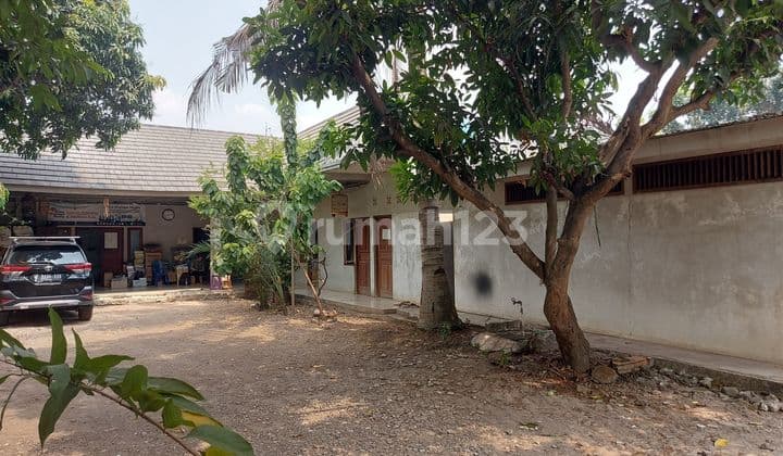 Dijual TANAH + bangunan gratis tidak dihtng... ,luas bangunan 215m2 ada 2 rumah tempat usaha percetakan.