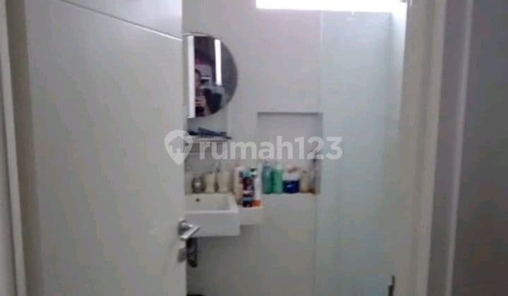 Rumah Minimalis di Northwest Lake, Citraland Utara, Surabaya