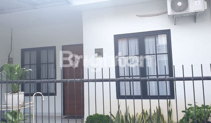 rumah kecil, harga terjangkau, kenyamanan maksimal di graha raya