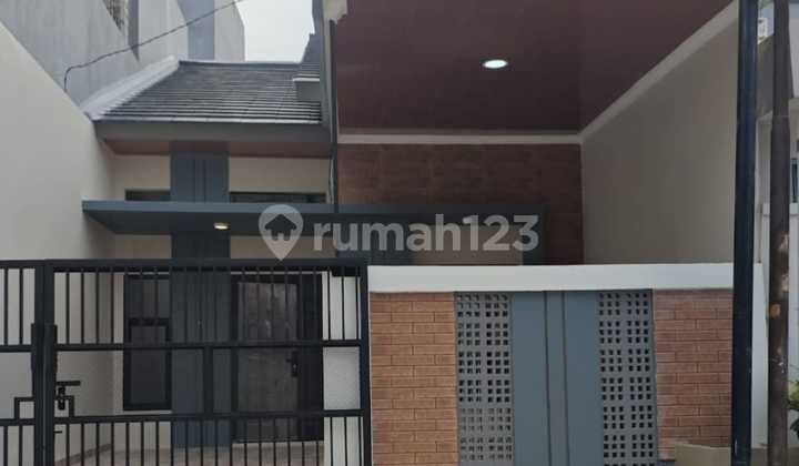 Rumah Strategis di Taman Harapan Baru bisa KPR (22205 Fd)