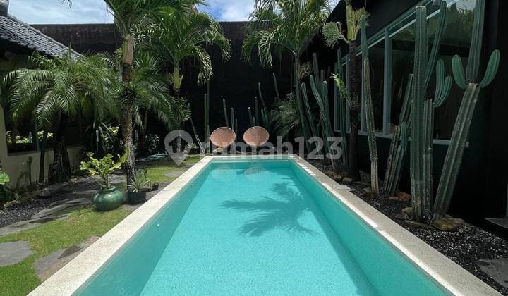 Charming 3-Bedroom Family Villa for Long-Term Rent, featuring a private pool, studio, and modern tropical design, fully furnished and centrally located in Canggu, minutes from Batu Bolong & Echo Beach | IP 675