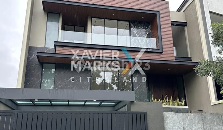 Rumah Citraland Waterfront Bangunan Mewah Desain Minimalis Modern