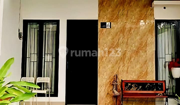 Beautiful 2-story House with a Villa Ambience, Villa Dago Pamulang, Tangerang Selatan. Good House in Pamulang with SHM Certificate.