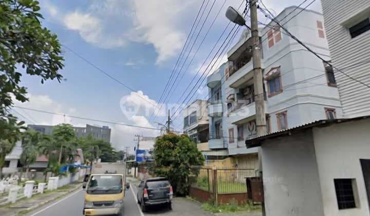 Gedung 4Lt Dekat Monumen Guru Patimpus